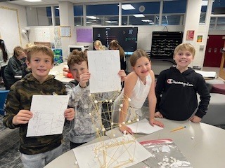 students creating towers with spaghetti and marshmallows