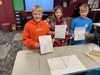 students creating towers with spaghetti and marshmallows
