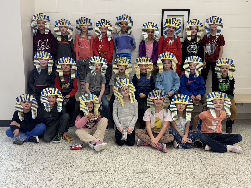 Students wearing egyptian headdresses