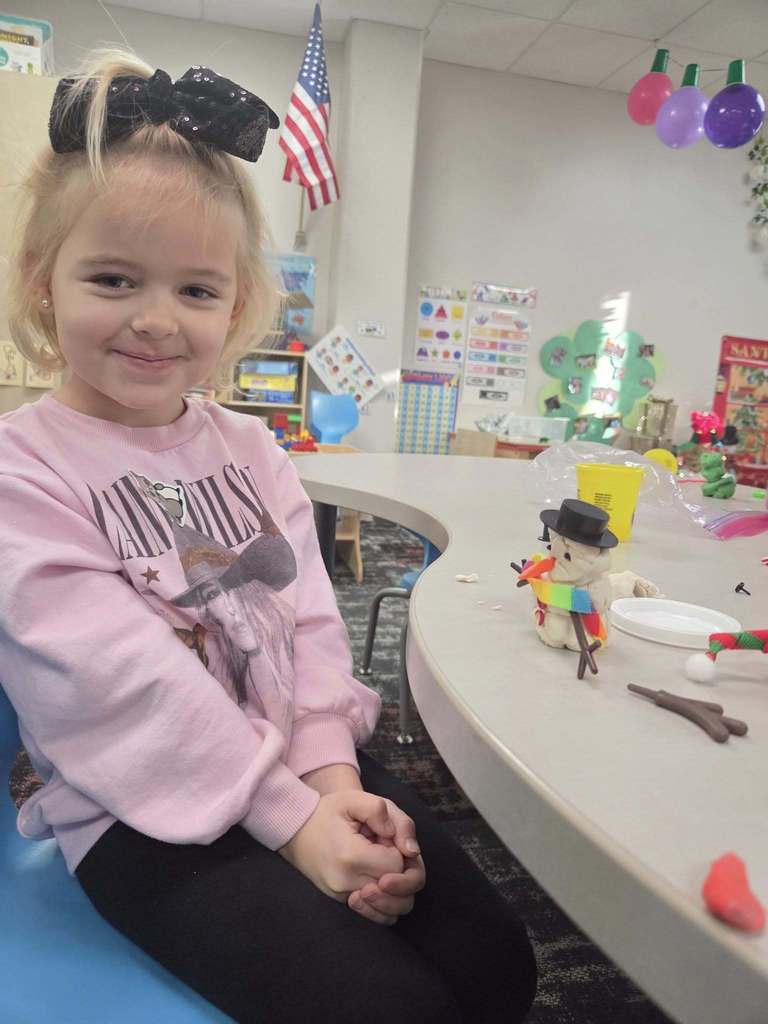 preschool student playing with playdough