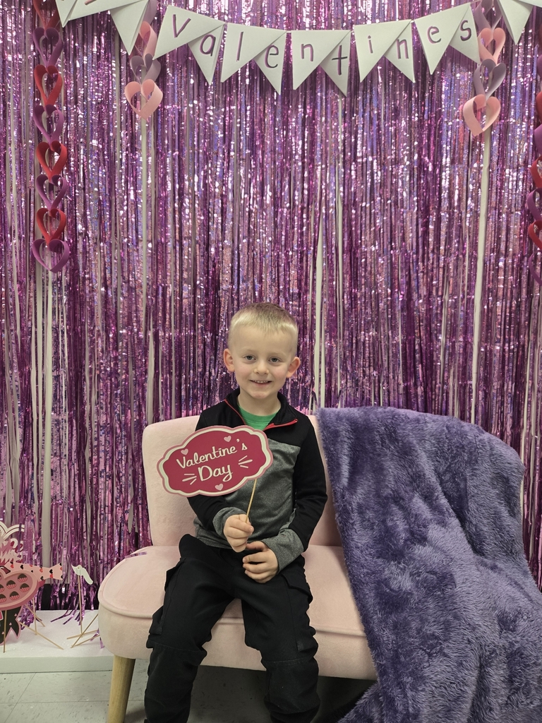 future preschooler in front of valentines sign