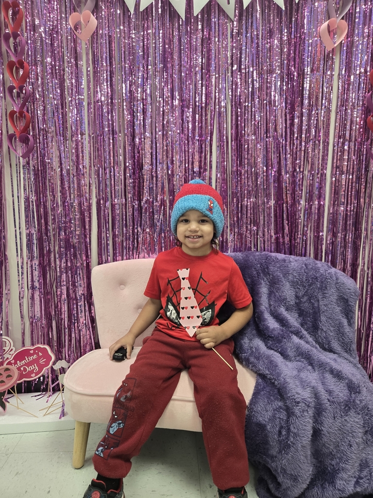 future preschooler in front of valentines sign