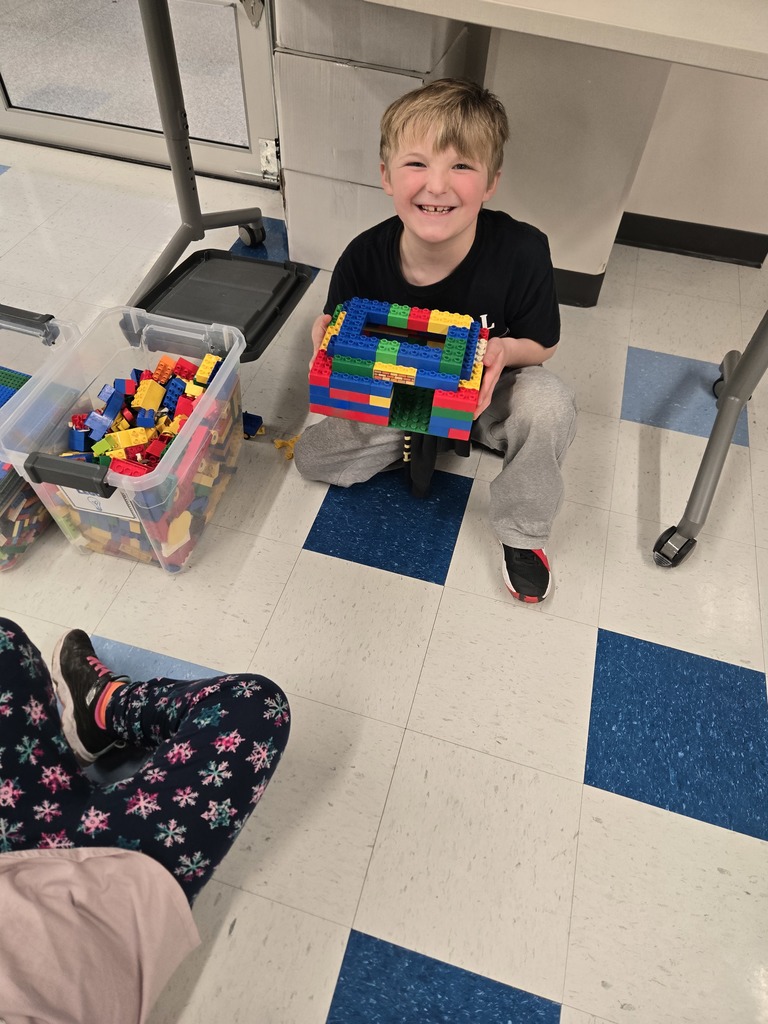 Student with lego creation 