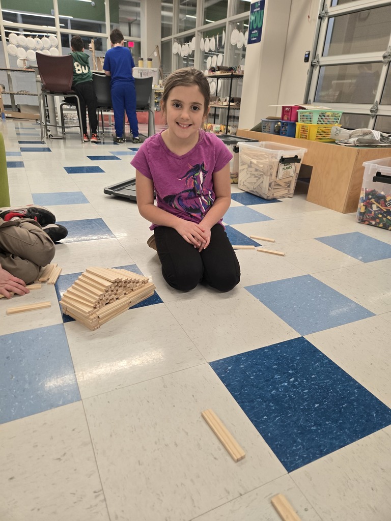 Student with building blocks