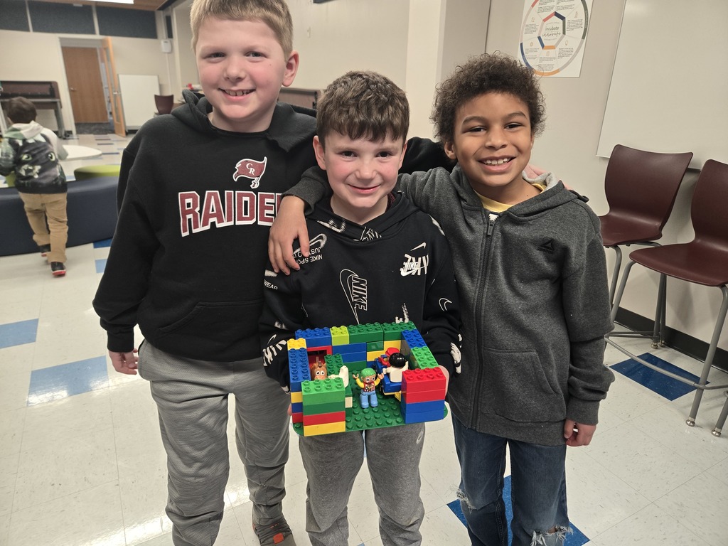 Three Students with lego creation 