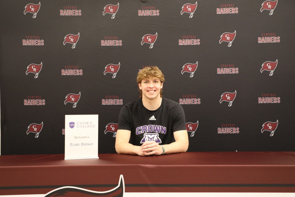 A high school senior after signing a letter of intent to further his athletic career