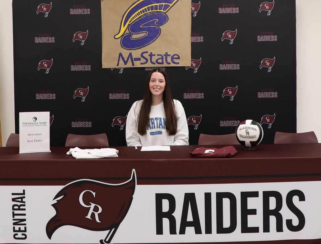 A high school senior after signing to play college volleyball