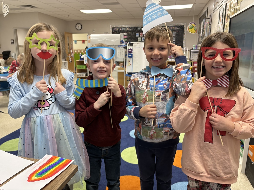 kindergarteners with photo prop items