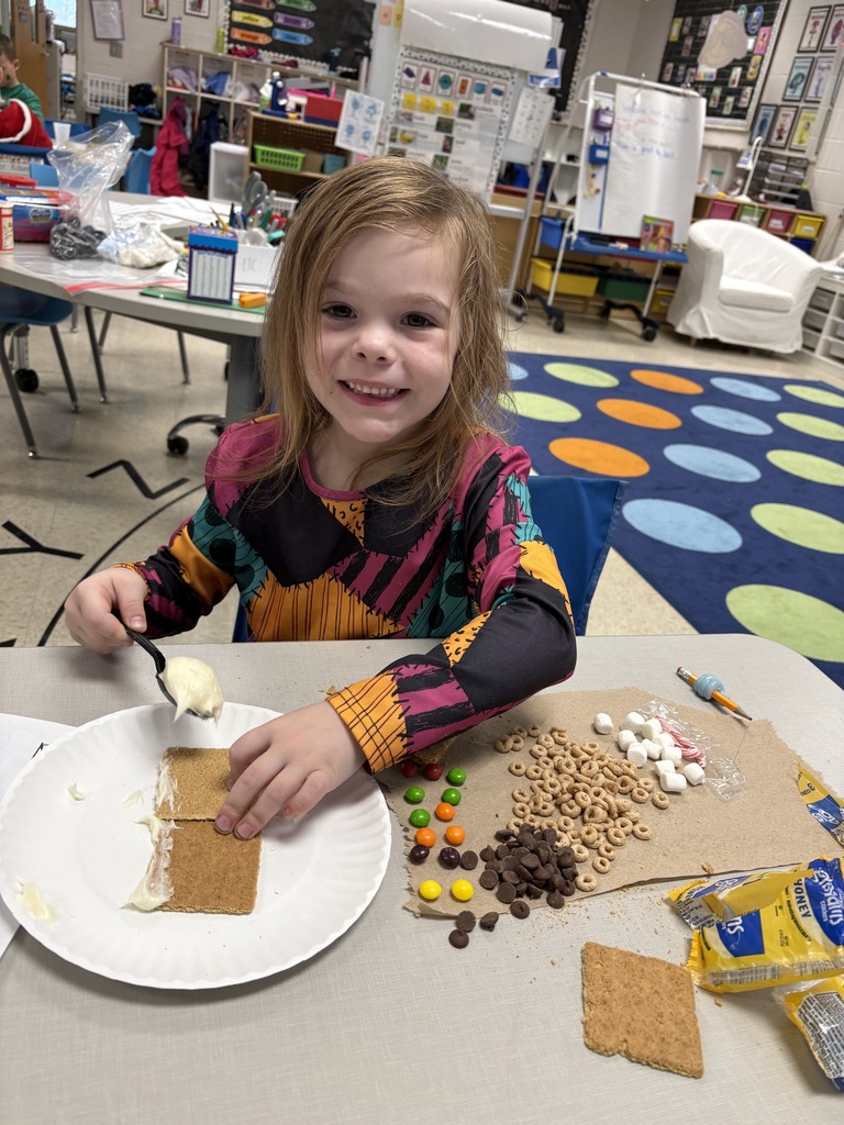 kindergartener frosting graham cracker