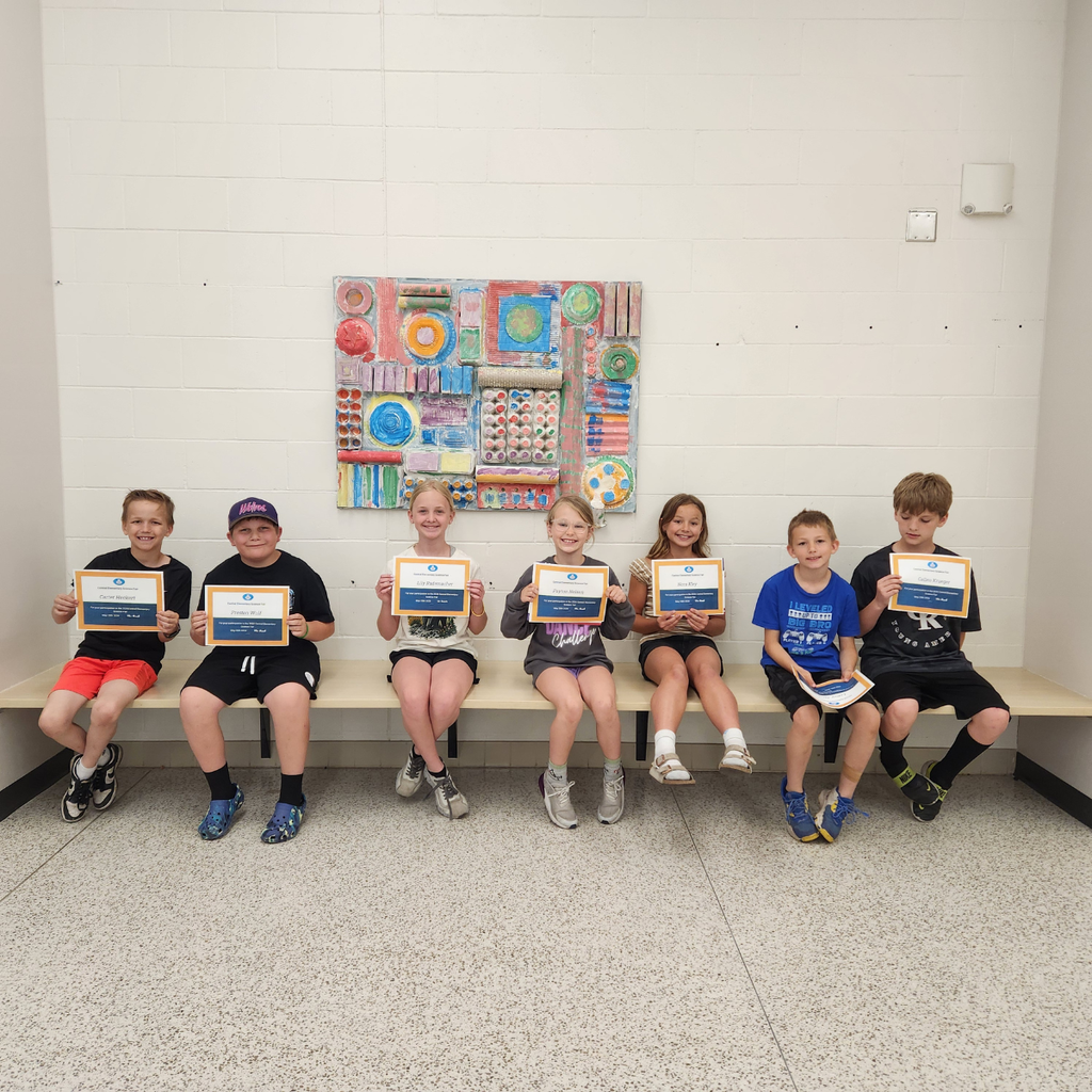 elementary students with awards