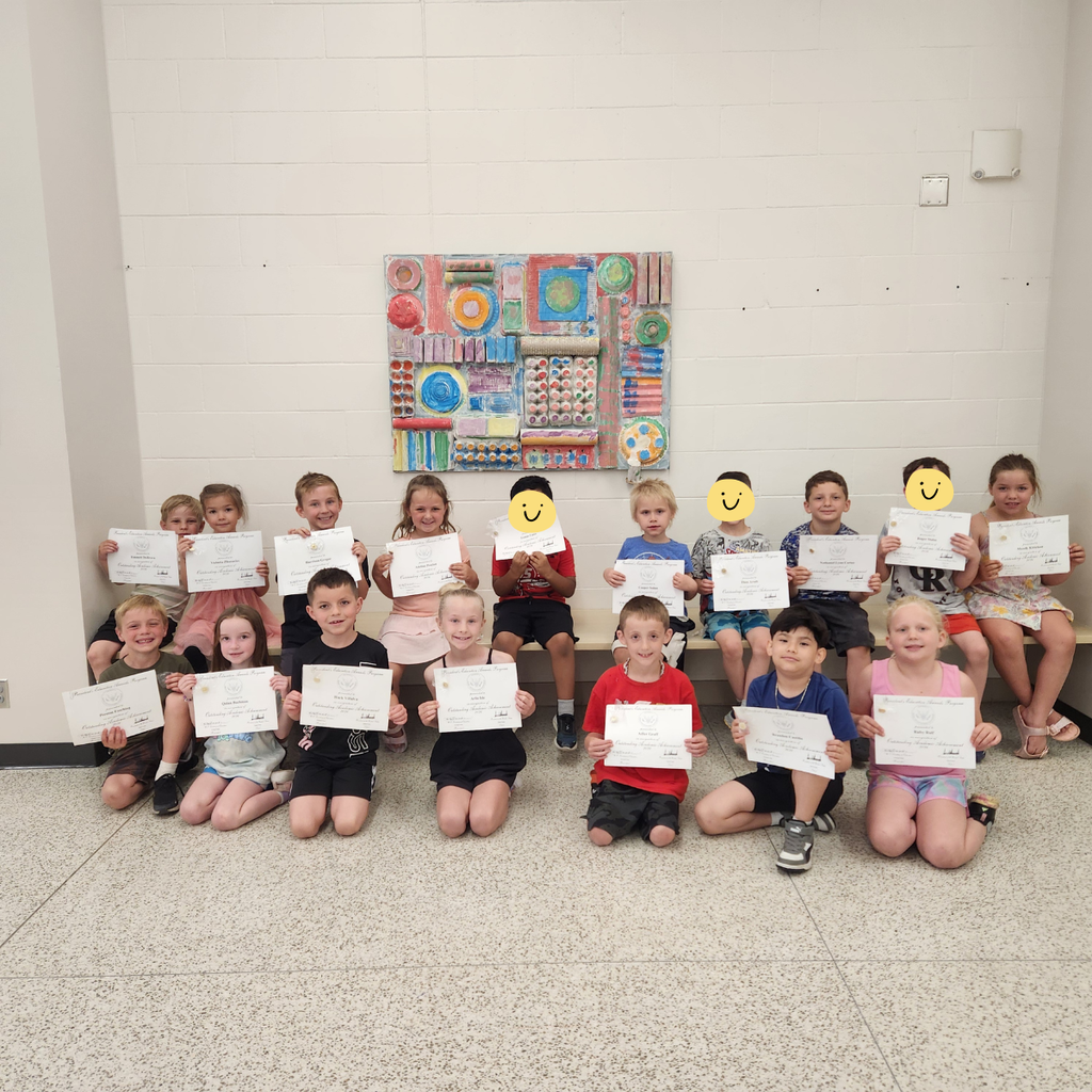 elementary students with awards