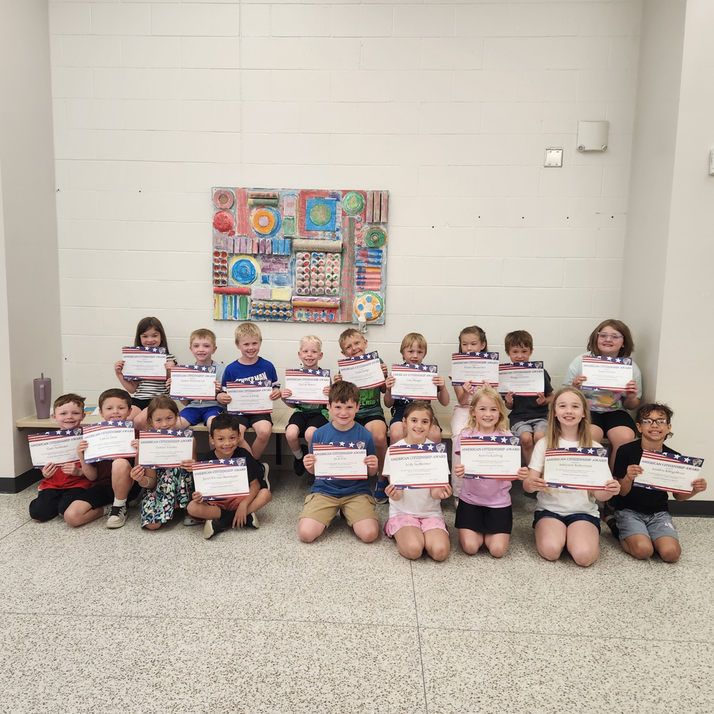 elementary students with awards