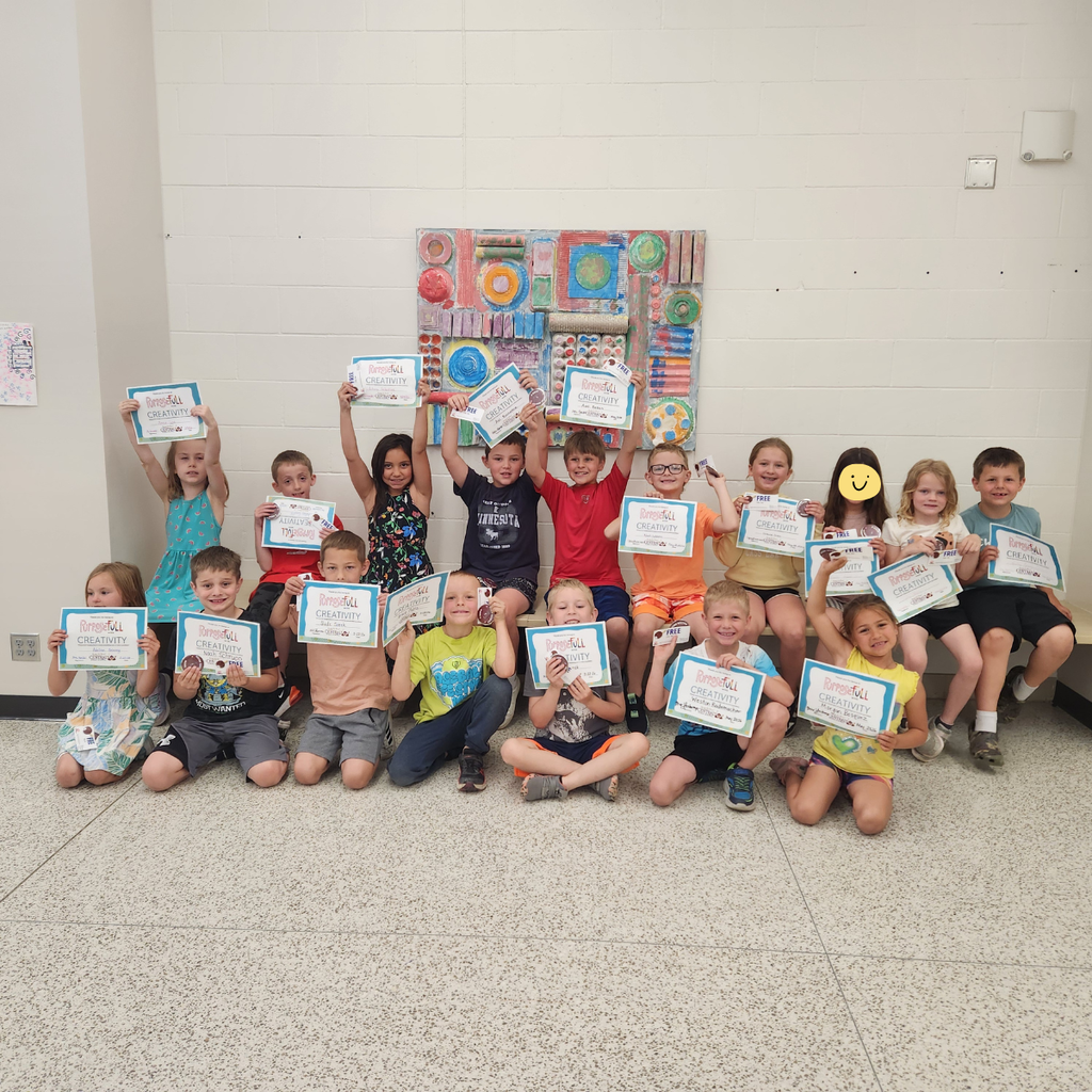 elementary students with awards