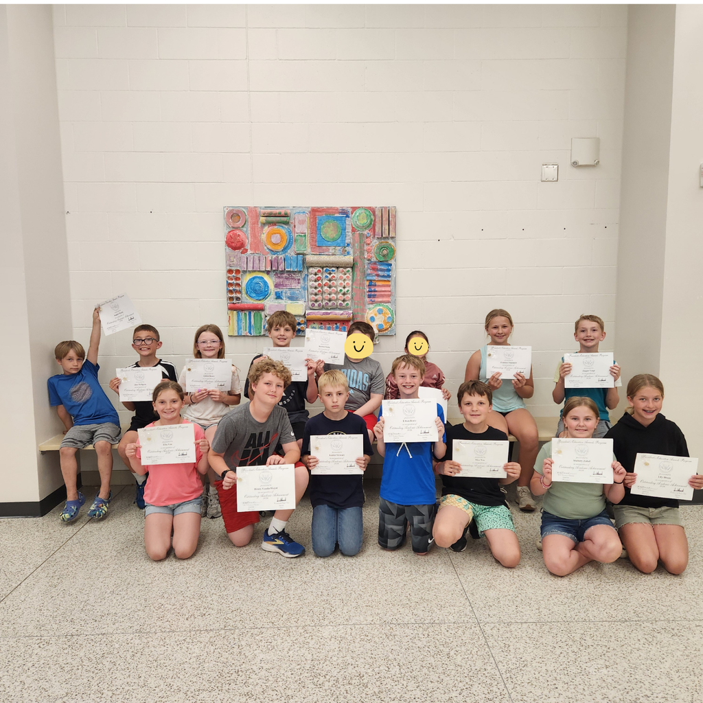 elementary students with awards