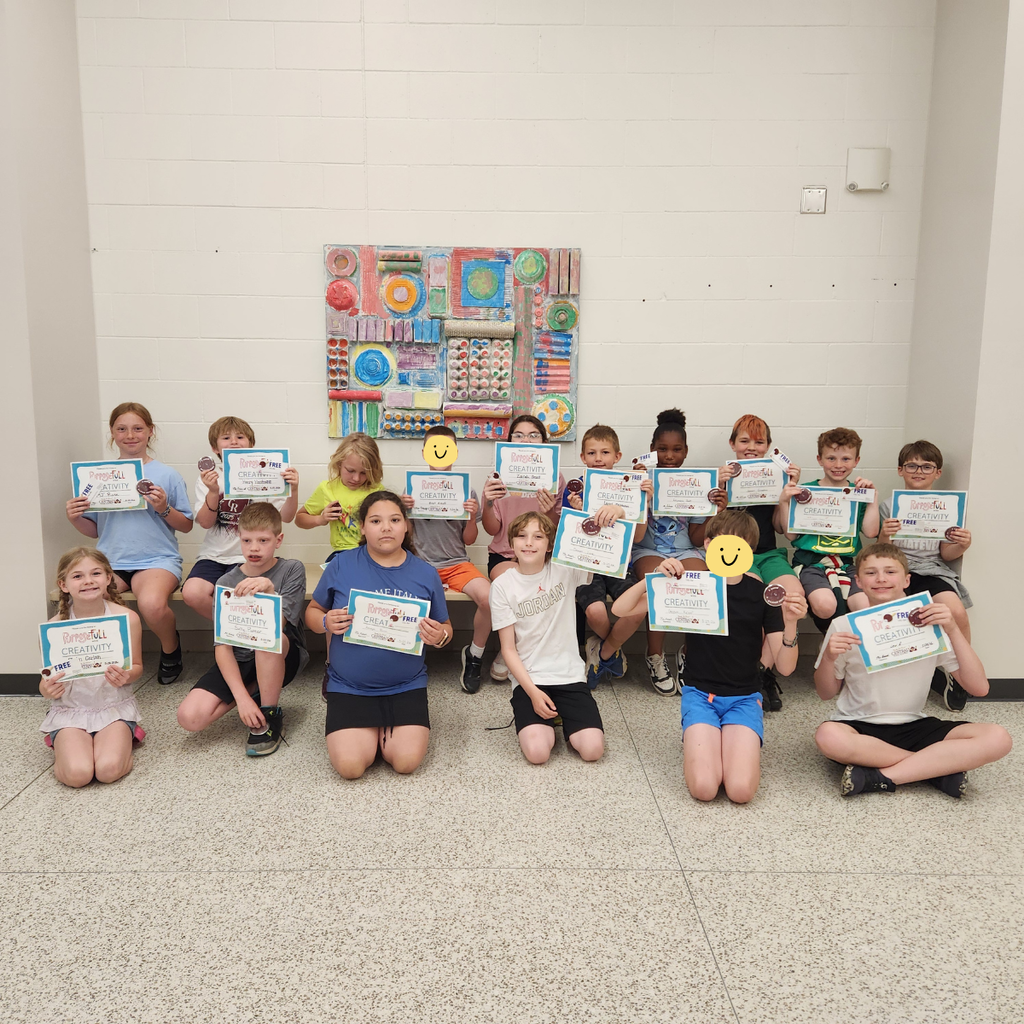 elementary students with awards