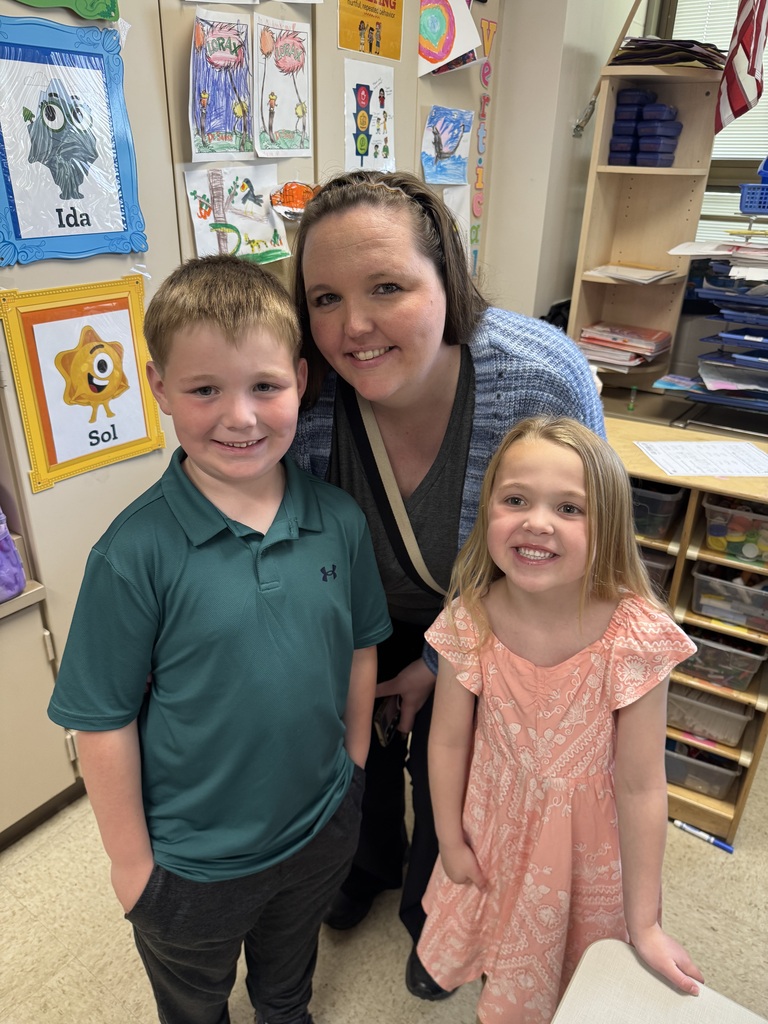 first grade students with families at school