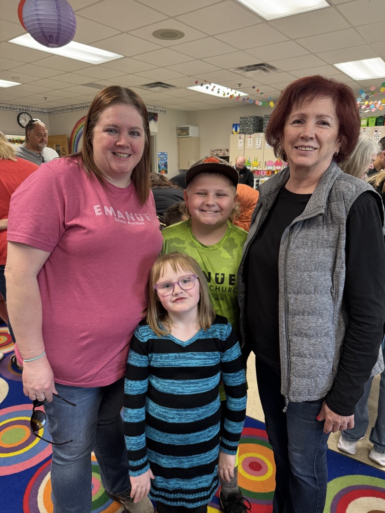 first grade students with families at school