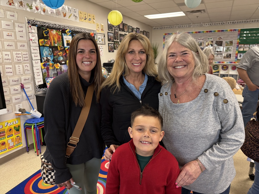first grade students with families at school