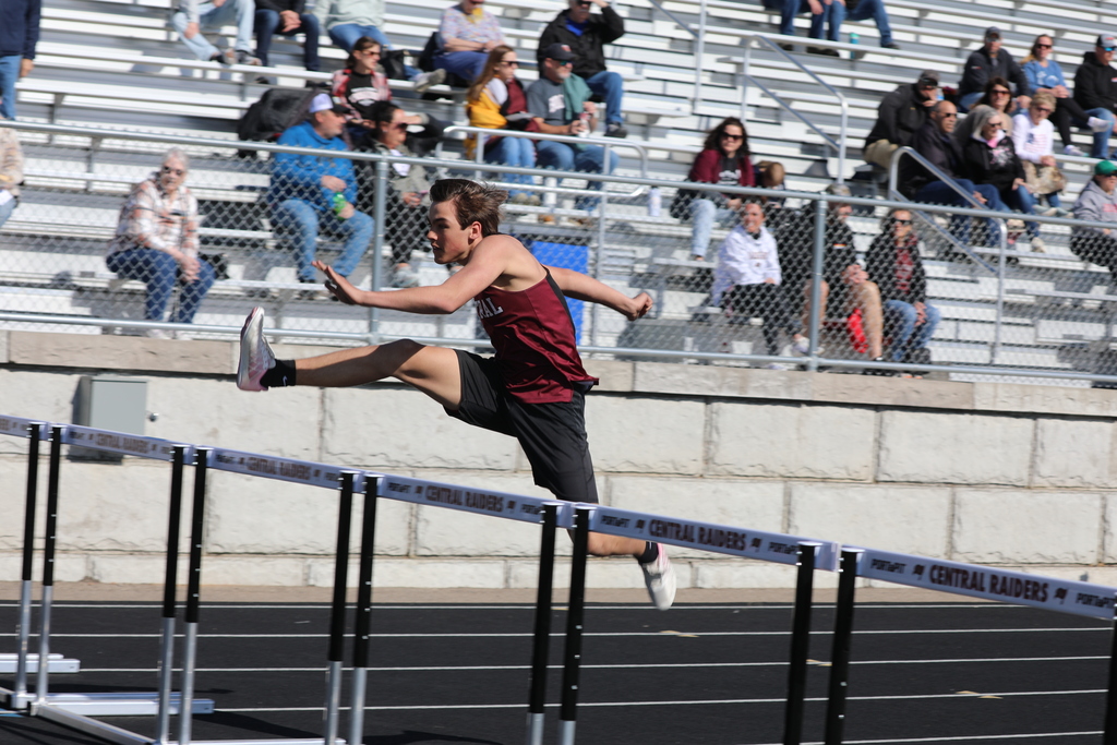 boys track hurdles