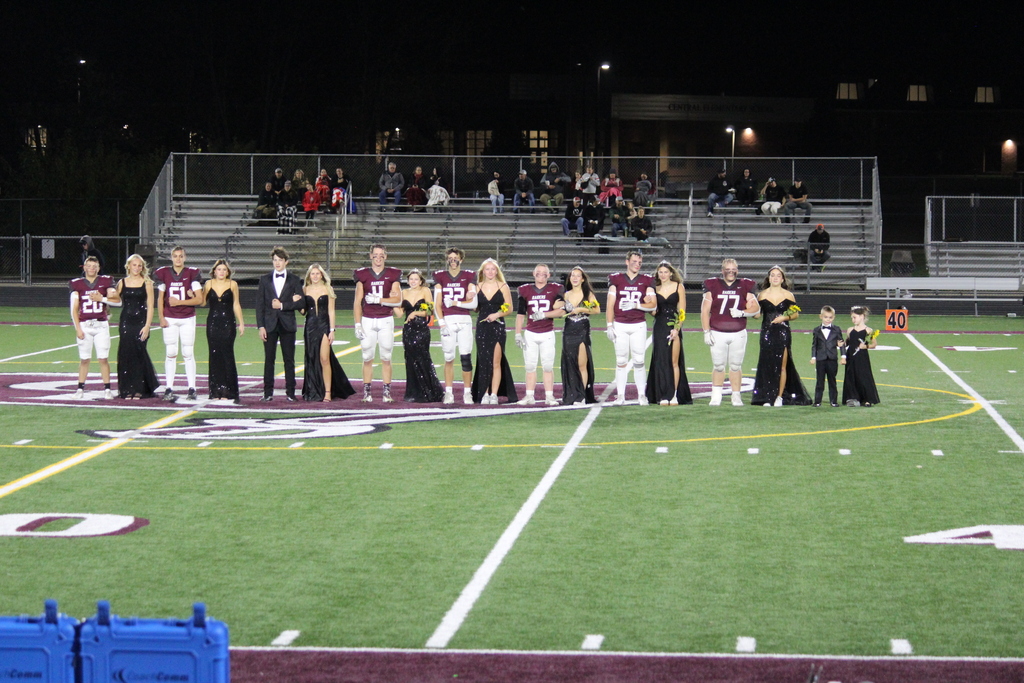 homecoming court on football field