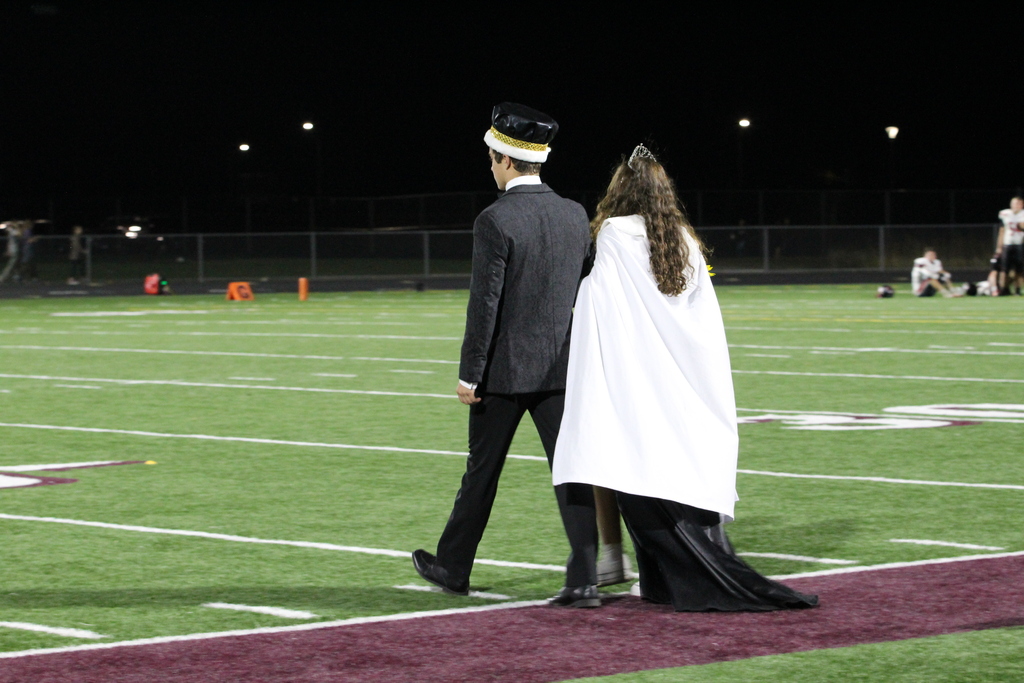 homecoming court on football field