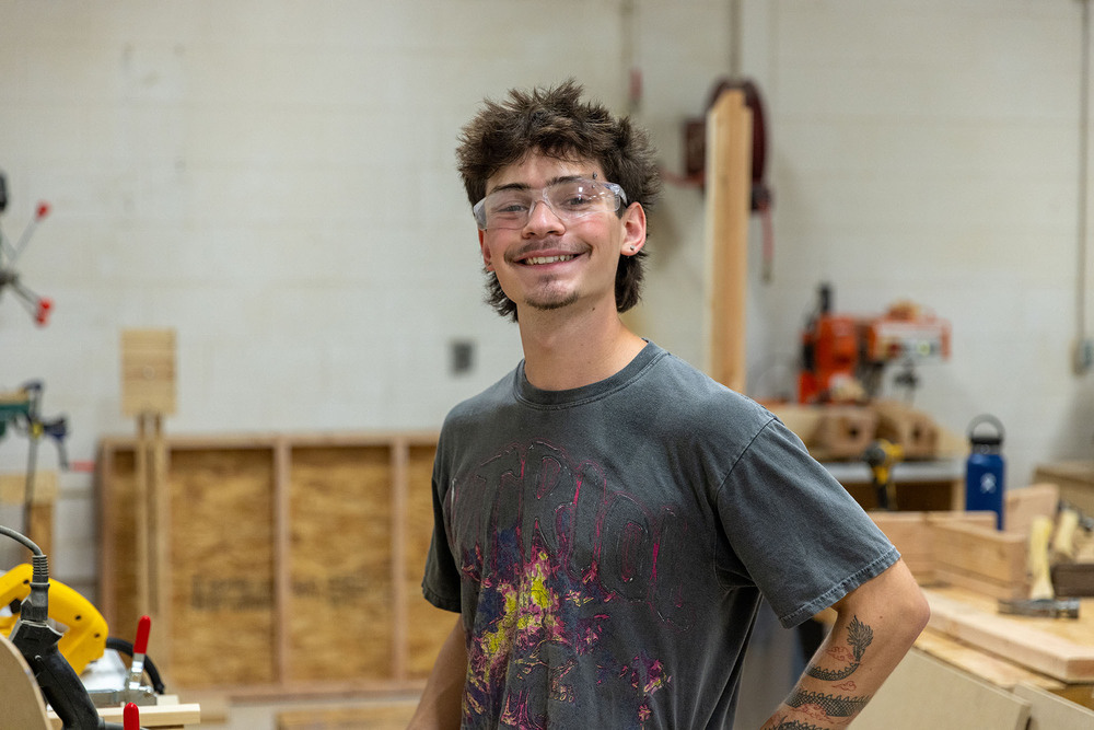 Construction student stand in the classroom at Central Tech