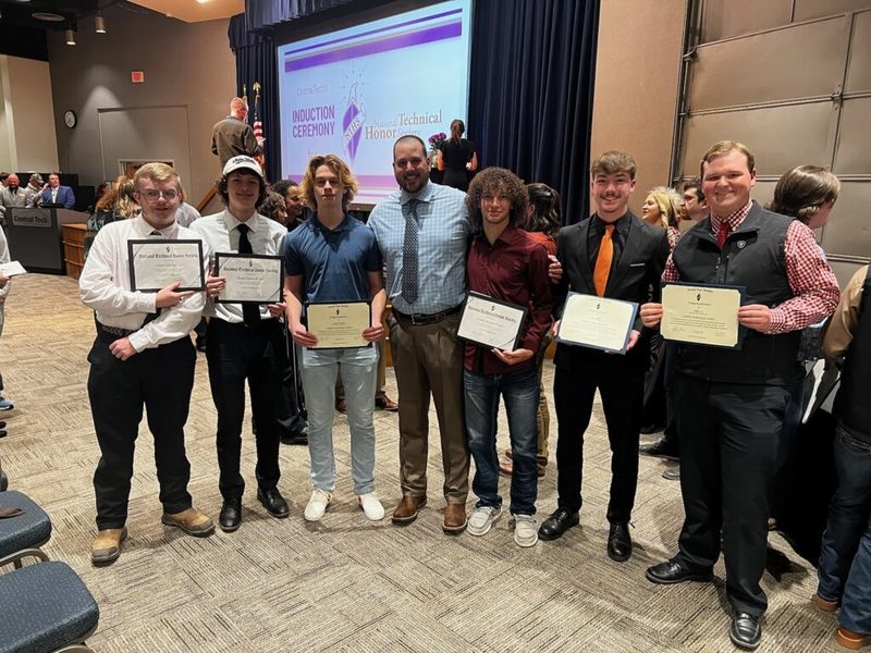 Students holding diploma