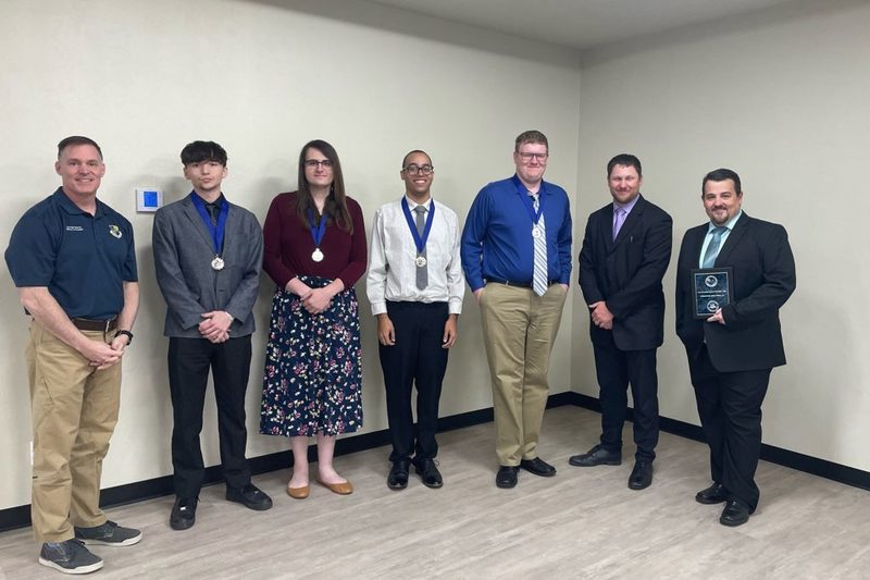 Adult team, 2nd place from L to R: Colonel G. Hall Sebren, Jr.; Cedric Mackey, Hominy; Morgan Kaiser, Drumright; DeVonte Jones, Cushing; Adain Wikel, Ripley