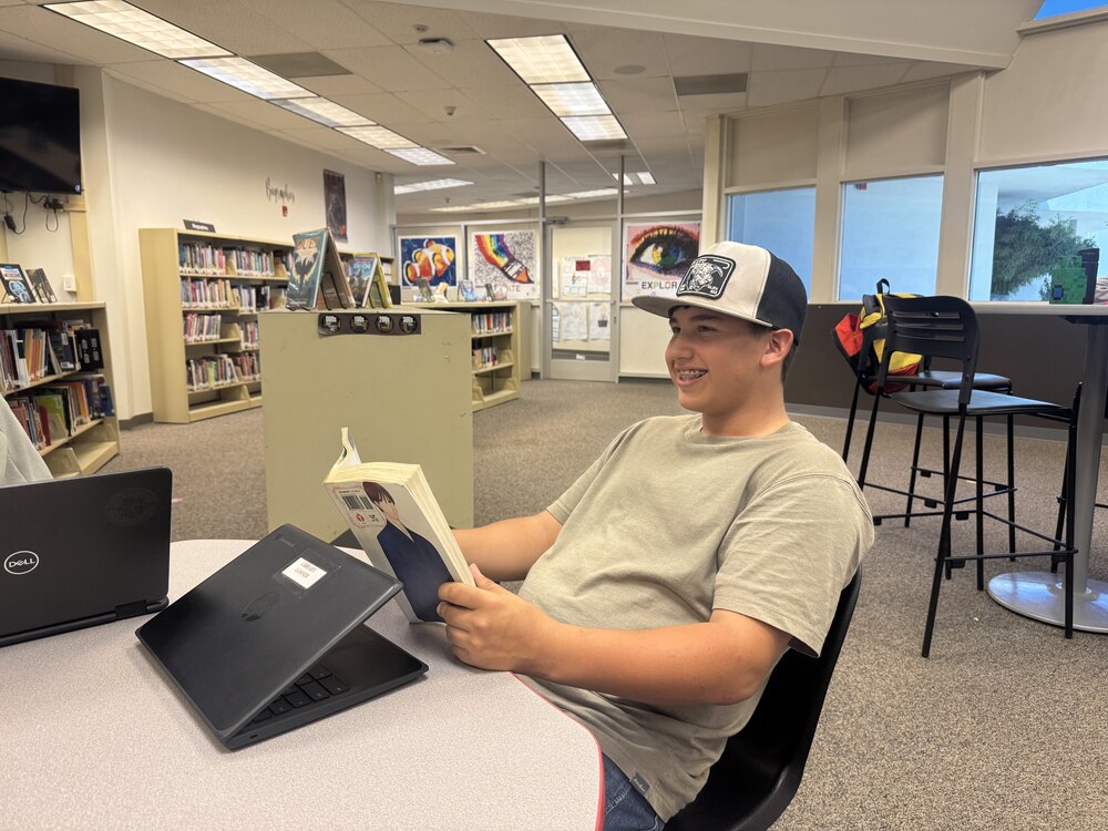 student enjoying the library