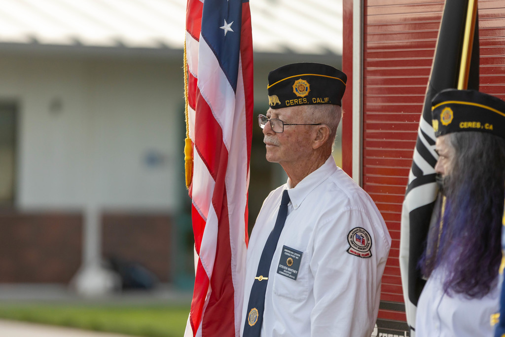 man holding an american flag