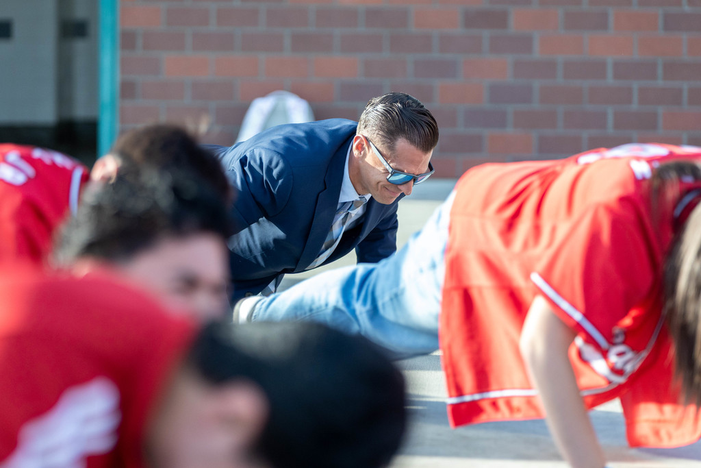 staff member doing push ups
