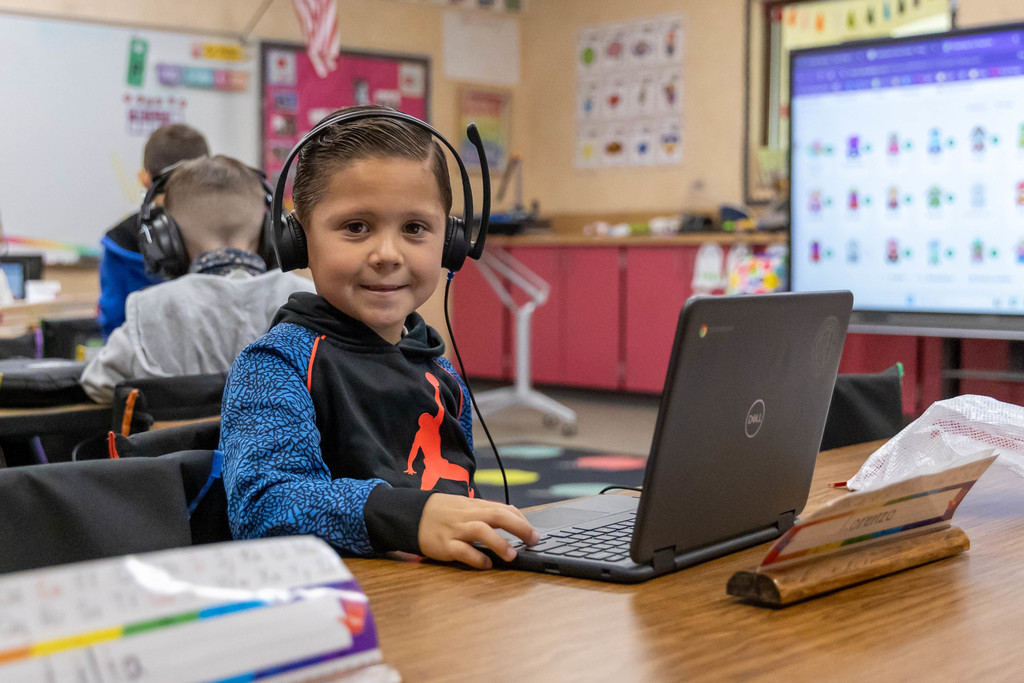 student working on a chromebook