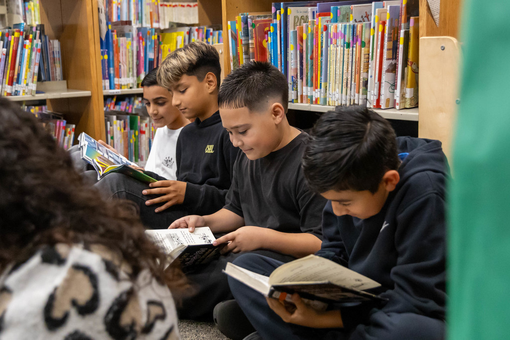 students reading books