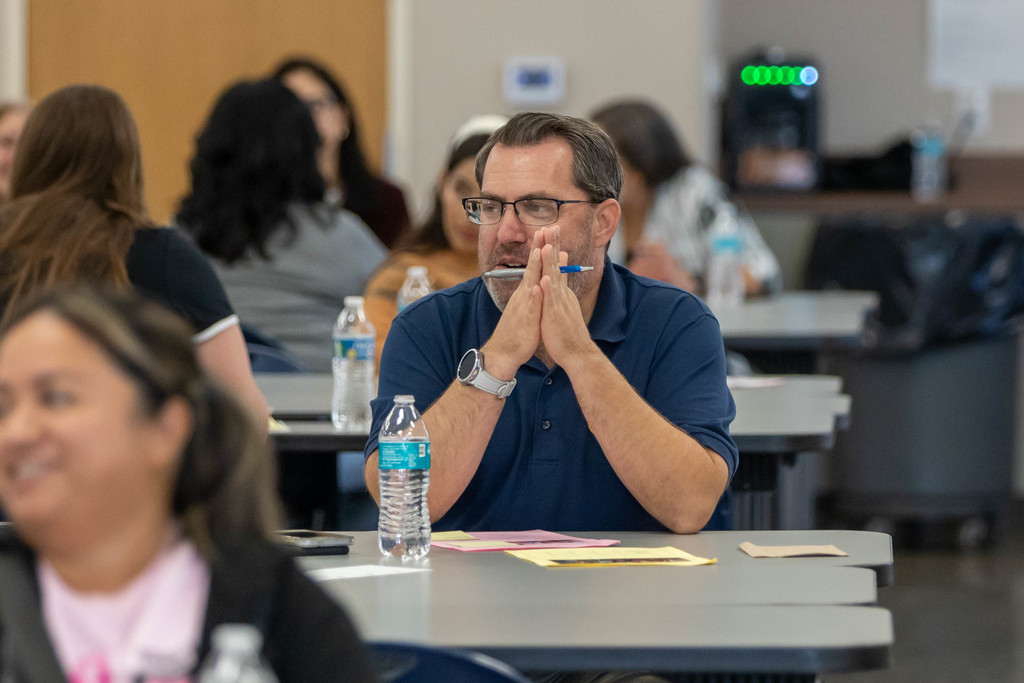 Man talking to a group of people