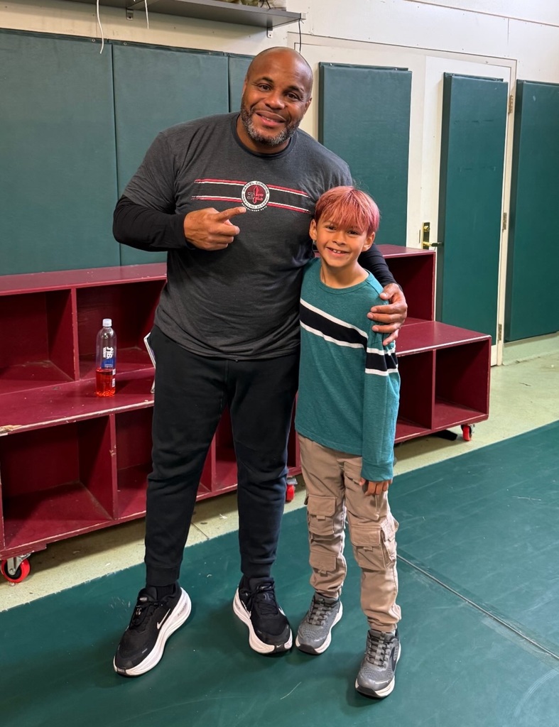 Daniel Cormier with student Liam