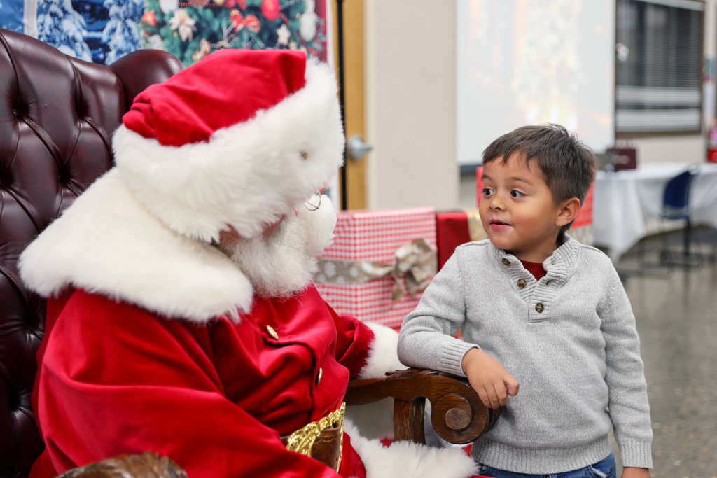 Little boy visits Santa