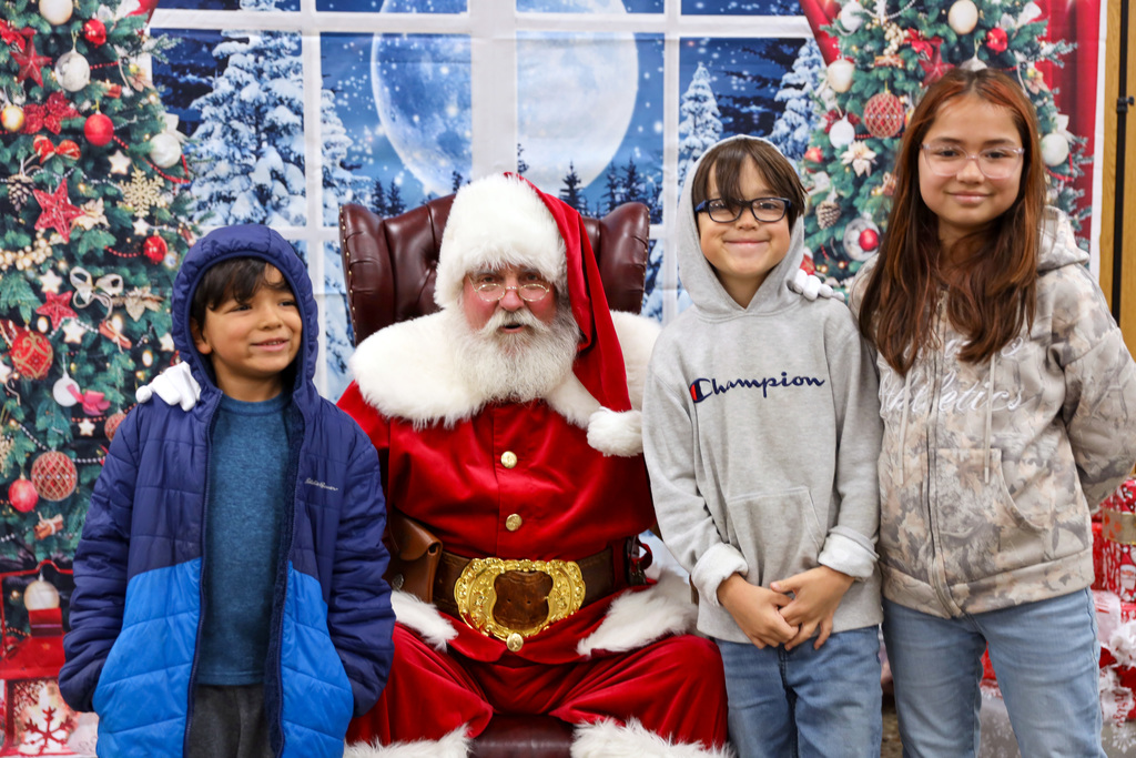 Three children with Santa