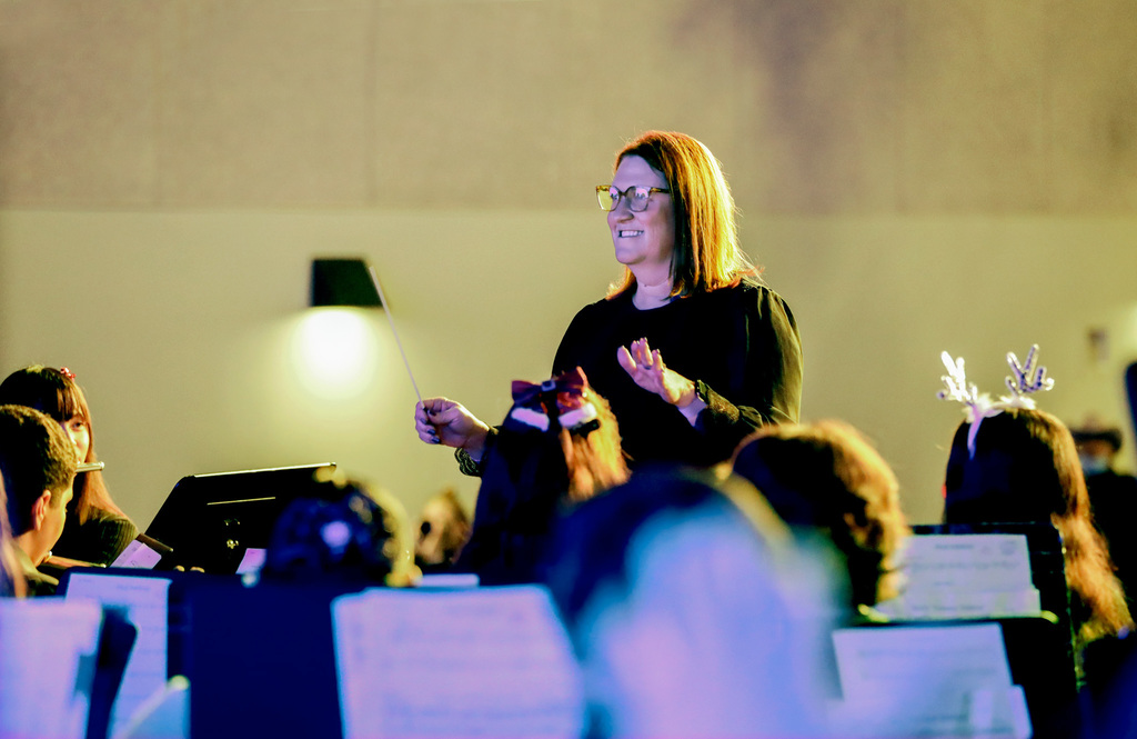 Superintendent on stage conducting