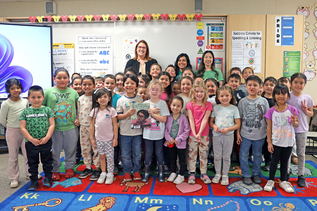 Dr. Peterman with class of kindergarten students