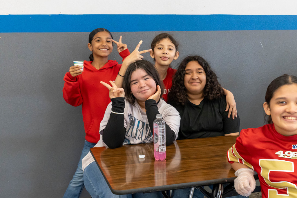 Students smiling at the camera