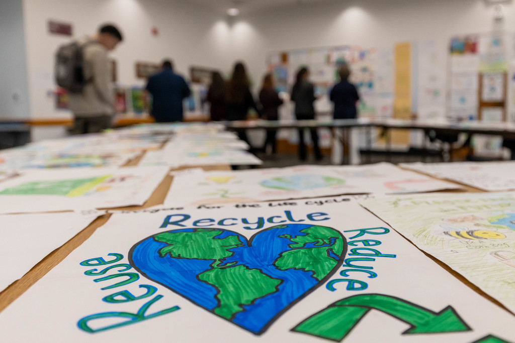 Small group of people looking at art