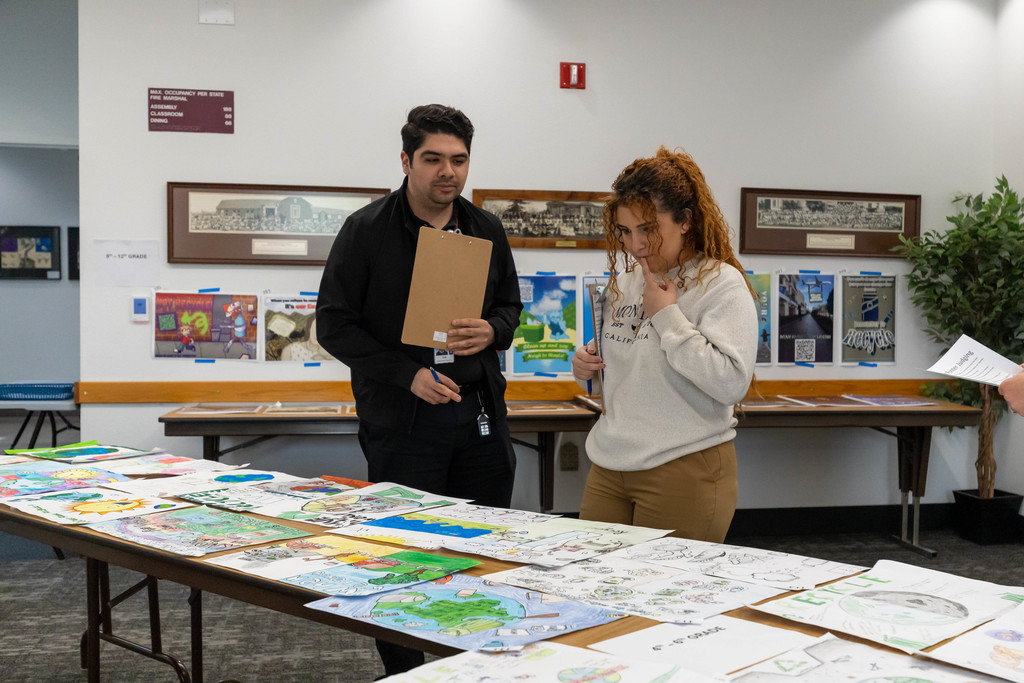 Small group of people looking at art