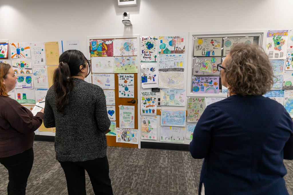 Small group of people looking at art