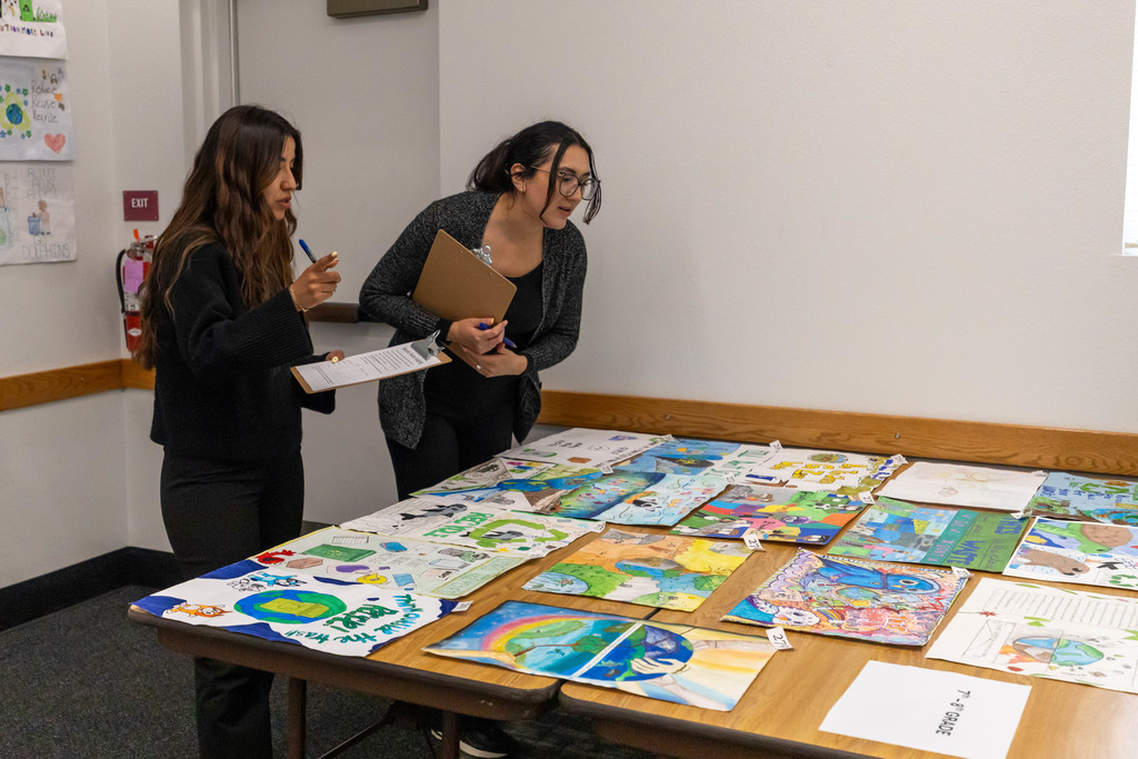 Small group of people looking at art