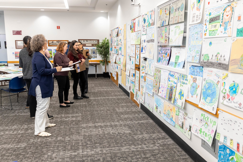 Small group of people looking at art