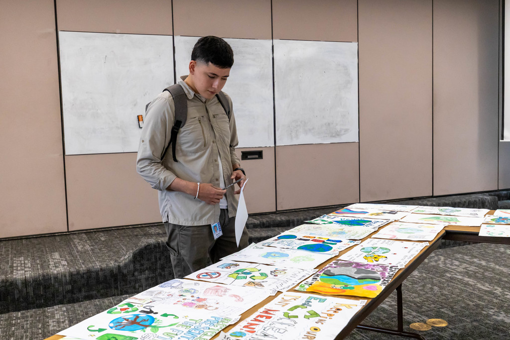 Small group of people looking at artSmall group of people looking at art