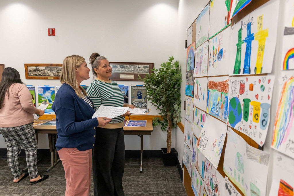 Small group of people looking at art