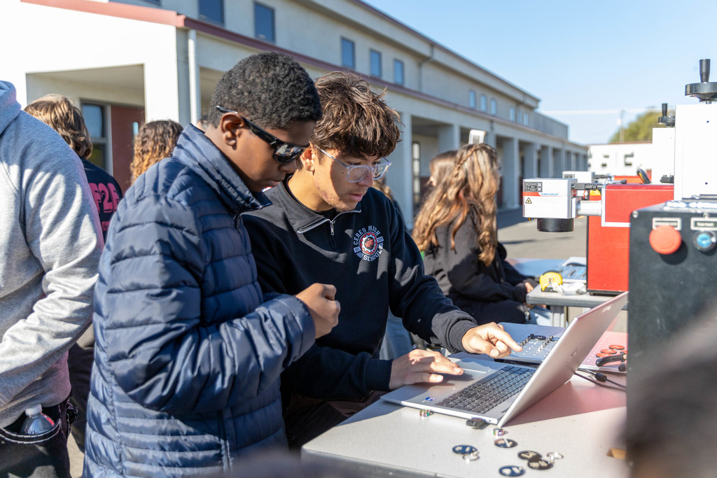 students working on a computer