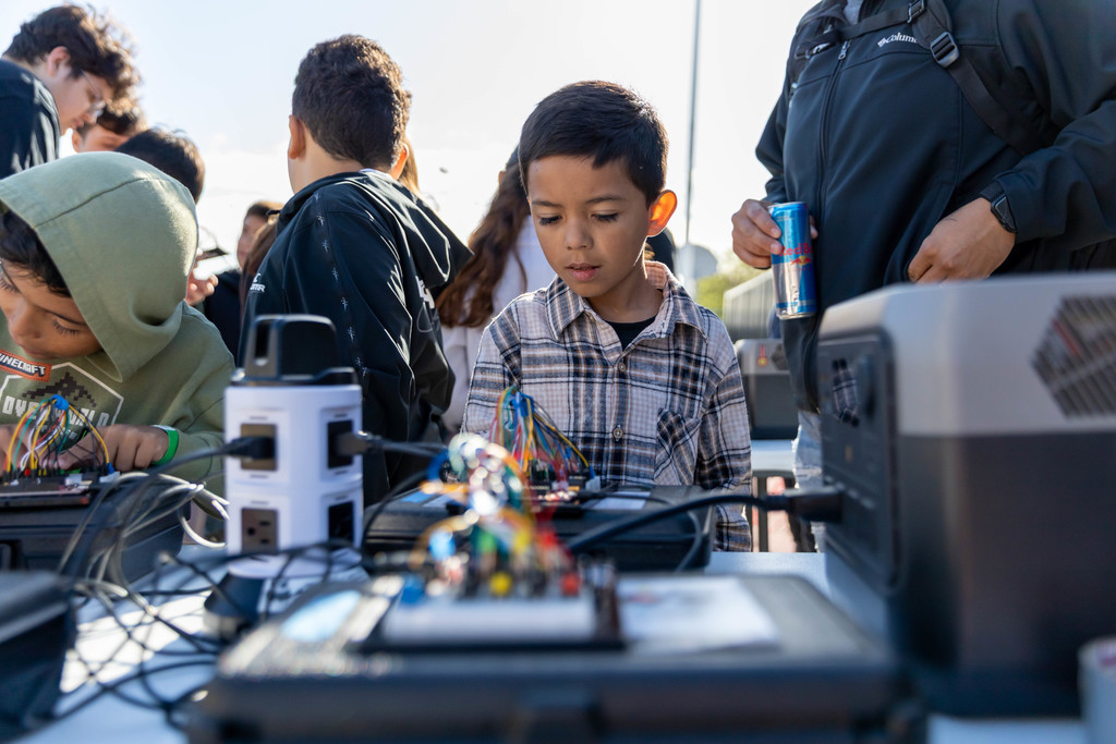 students playing with circuits