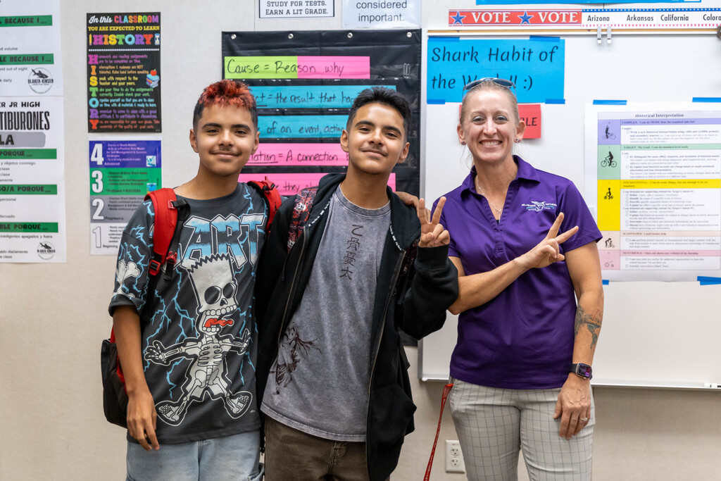 Staff and students smiling for a photo